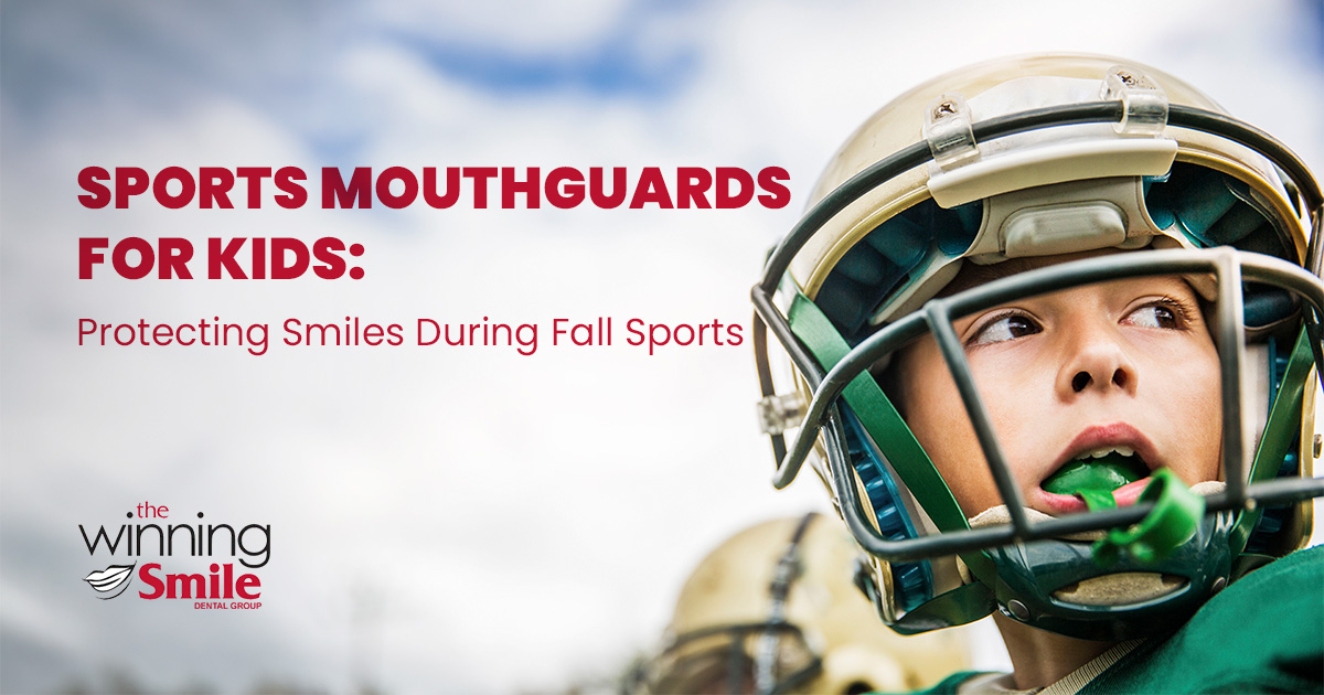 Young football player wearing a helmet and sports mouthguard to protect his teeth during fall sports